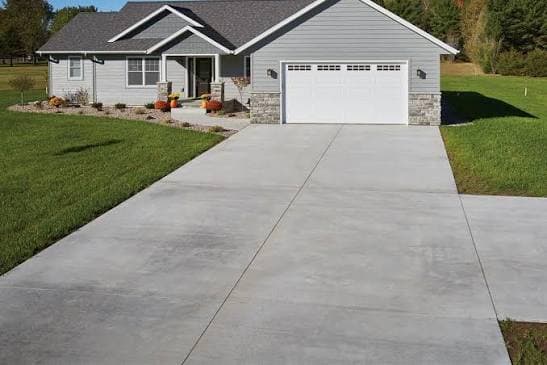 Finished broom-finish concrete driveway